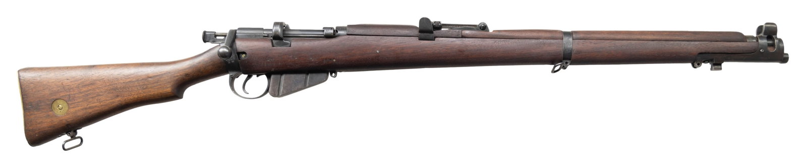 STANDARD SMALL ARMS SHT LE III* BOLT ACTION RIFLE.: Cal. 303 Brit. S# N 79797. Bbl. 25" Mfg. 1918 with King George V cypher. These rifles were issued to soldiers of the British forces during WWI. Decommissioned magazine cutoff. CONDITION: overall good 