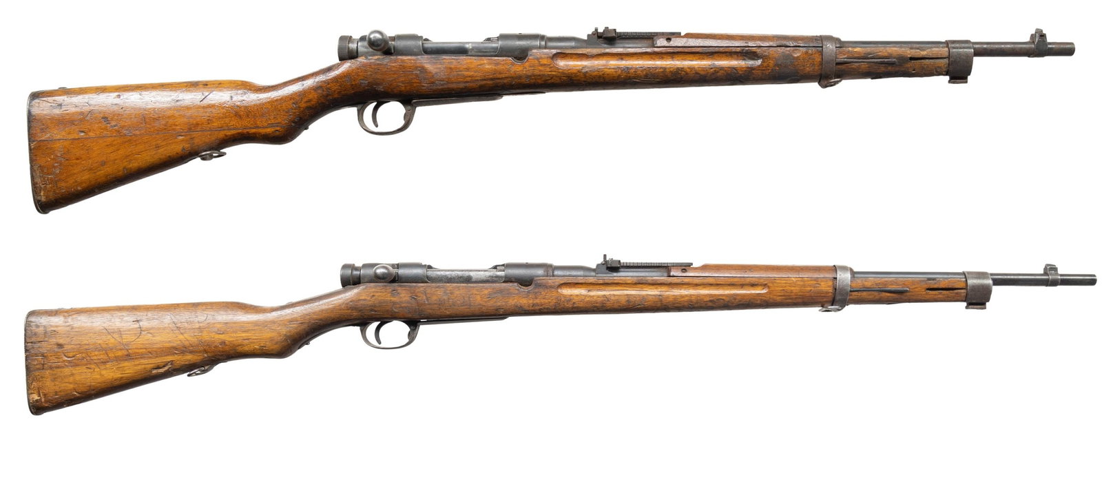 LOT OF TWO T38 ARISAKA CHINESE CONVERTED BOLT: ACTION RIFLES. Both Cal. 7.62x391) S# 73243. Bbl. 20" with import marking. Blade front sight. Ladder rear sight graduated to 2400m. Rear sight base is missing its screw. Bbl., floorplate & trigger