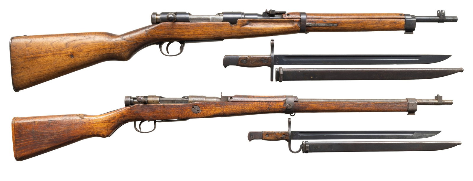 LOT OF TWO ARISAKA BOLT ACTION RIFLES.: 1) Japanese Type 38 Arisaka Bolt Action Carbine. Cal. 6.5 Jap. S# 82517. Bbl. 19". Blade front sight with protective ears. Ladder rear sight graduated to 2000m. Matching assembly numbers on