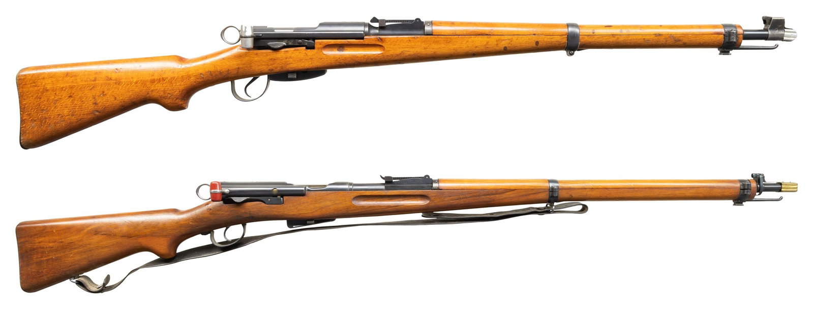 LOT OF TWO SWISS STRAIGHT PULL BOLT ACTION RIFLES.: Both Cal. 7.5 Swiss.1) Swiss K31 Rifle. S# 870116. Bbl. 25 1/2". Standard K31 military sights. All visible matching numbers. Arsenal blue finish. Beech stock set with left side sling provisions & rear