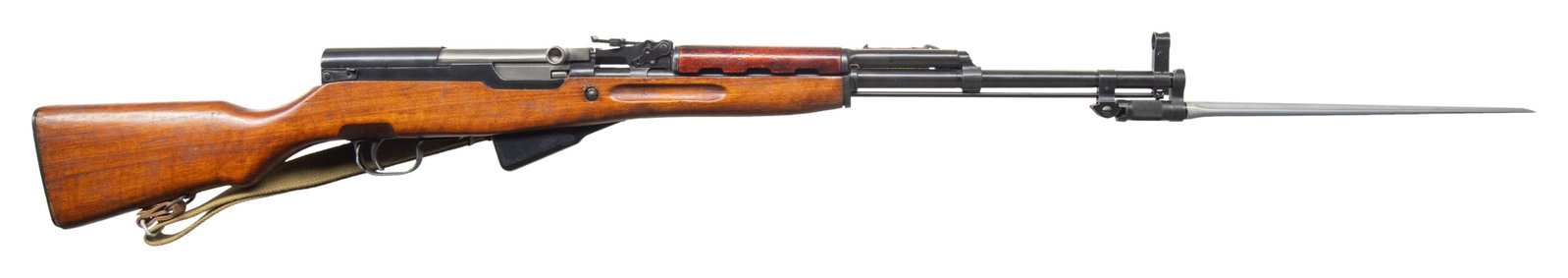 NORINCO SKS SEMI AUTO RIFLE.: Cal. 7.62x39. S# 1606514k. Bbl. 20 1/2". Standard SKS sights. Stock & mag appear to be of Chinese mfr. but they are mismatched. Other visible parts are matching to the receiver. Left side of reliever 