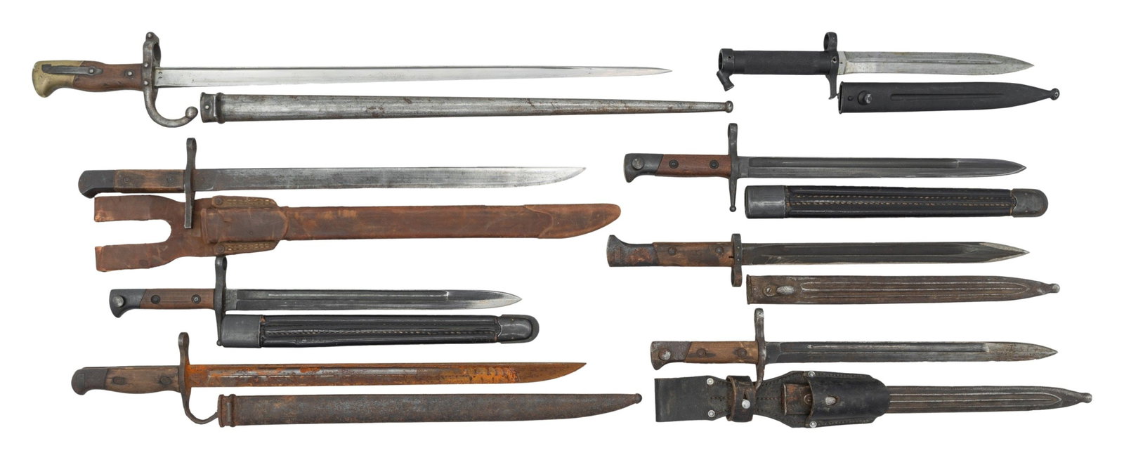 8 FOREIGN BAYONETS.: This lot of foreign bayonets include 2 Italian carcano bayonets with leather scabbards, 1 Italian carcano bayonet with a metal scabbard and Mauser K98 frog, 1 Japanese arisaka bayonet with rubberized
