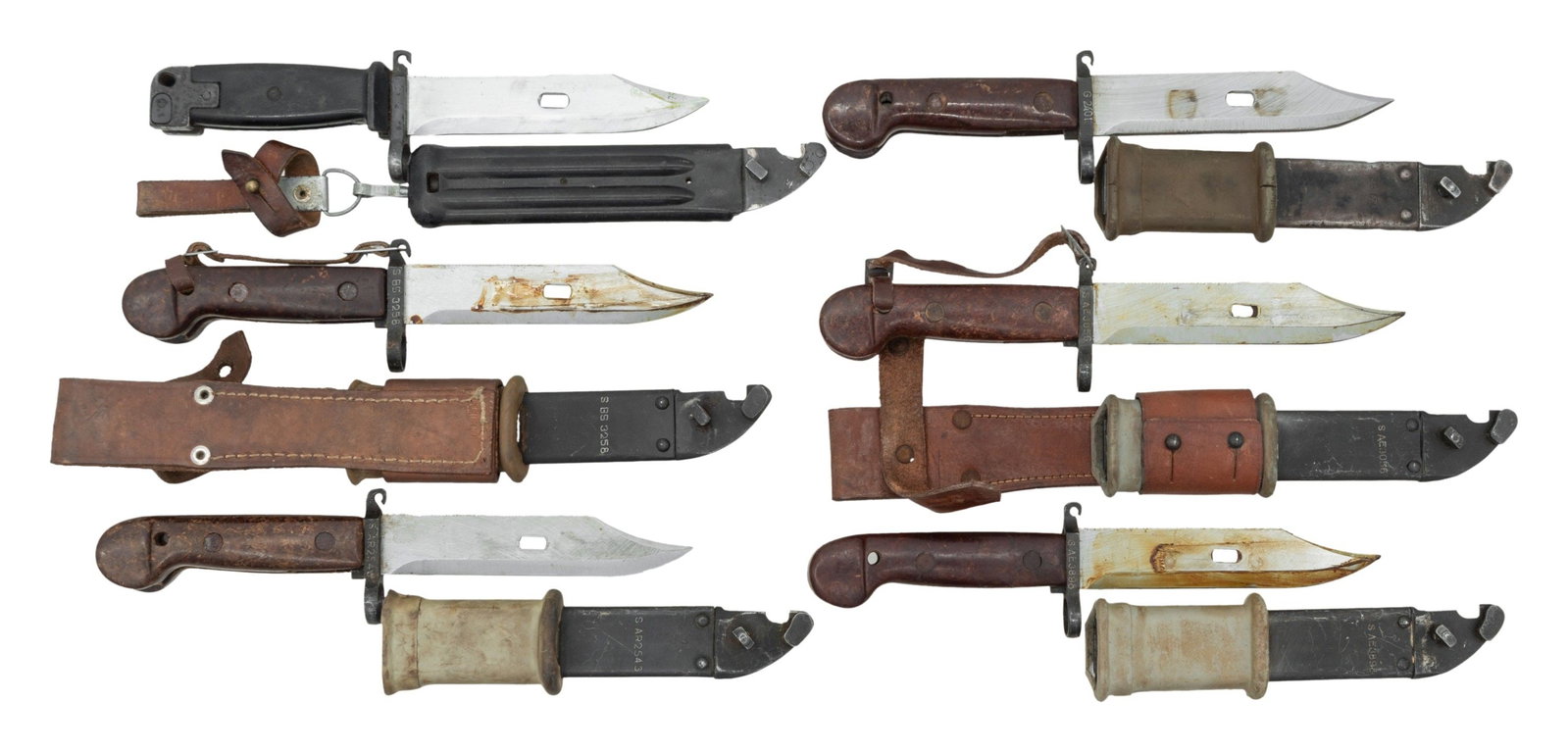 6 KALASHNIKOV BAYONETS.: 1- (4) ROMANIAN AKM with matching numbered scabbard. (1) Romanian AKM with mismatched scabbard.2- EAST GERMAN AKM with matching scabbard. (02-26108/ZAL). NON-GUN. $200-300.