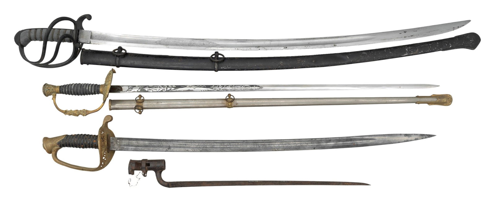 3 US SWORDS AND 1 BAYONET.: This group consists of 1) US M1860 staff and fild officer's sword measuring 36" overall with an etched 29" blade. Etching includes military, patriotic and foliate motifs. Gilded brass hilt with shark
