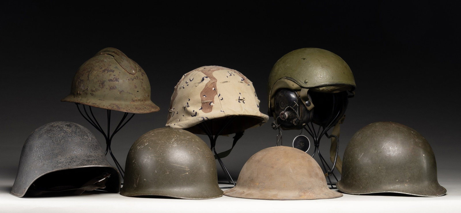 LOT OF U.S. & FOREIGN MILITARY HELMETS. (1 of 3)