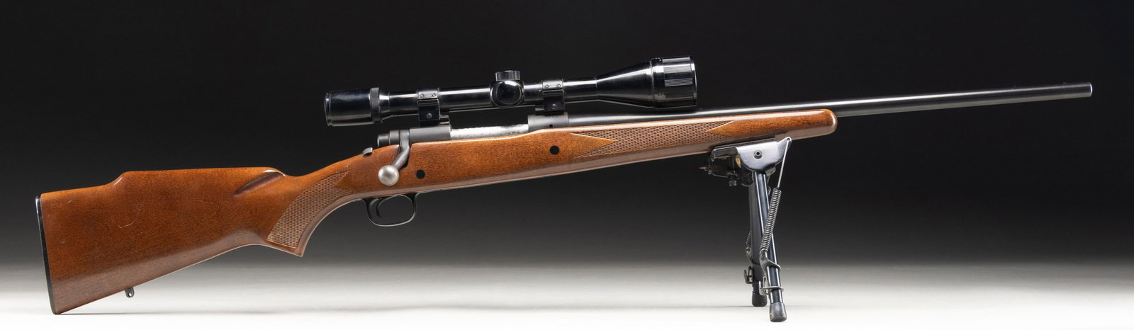 WINCHESTER MODEL 670 BOLT ACTION RIFLE.: Cal. 225 Win. S# 102189. Bbl. 22". Model 670 bolt action rifle mfg. by Winchester between 1966-1979. Left side of the bbl. is marked with Winchester's mfg. information, followed by the Winchester trad