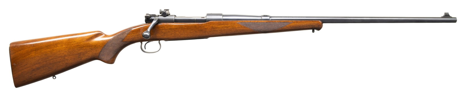 WINCHESTER M54 BOLT ACTION RIFLE.: Cal. 30-06. S# 26001A. Mfg. 1929. Bbl. 24" Nickel Steel with pinned brass bead front sight. Williams rear dovetail filler. Lyman adjustable rec peep sight. Checkered pistol grip stock with serrated st