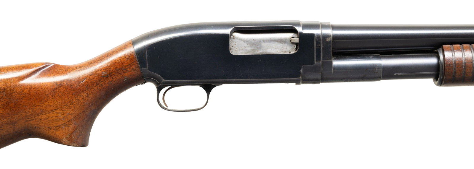 PRE-64 WINCHESTER MODEL 12 PUMP ACTION SHOTGUN.: Cal. 12 GA, 3". S# 1414968. Bbl. 28 1/4" (over Poly Choke). Model 12 pump action shotgun mfg. by Winchester in 1954. Left side of the bbl. is marked with the model and cal. designations, followed by a