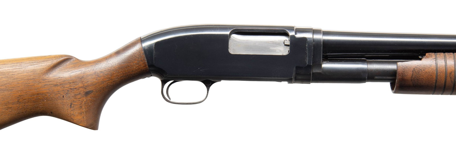 WINCHESTER M12 SLIDE ACTION SHOTGUN.: Cal. 12ga 2 3/4". S# 1900034. Mfg 1960. Bbl. 28" plain. Mod choke. Steel bead front sight. Walnut stock set. CONDITION: overall good. 95% orig bbl blue. 95% orig rec blue. Stock has scattered handling
