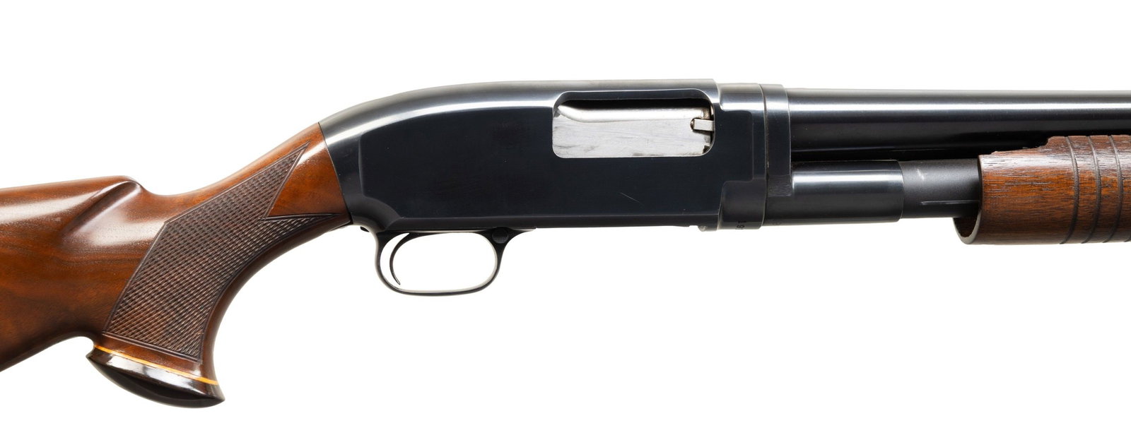 WINCHESTER M12 SLIDE ACTION SHOTGUN.: Cal. 12ga 3". S# 1912005. Mfg. 1960. Bbl. 30" plain. Marked "For Super Speed & Super-x 3" ". Full choke. Steel bead front sight. Factory forearm. Custom pistol grip buttstock. CONDITION: overall very 