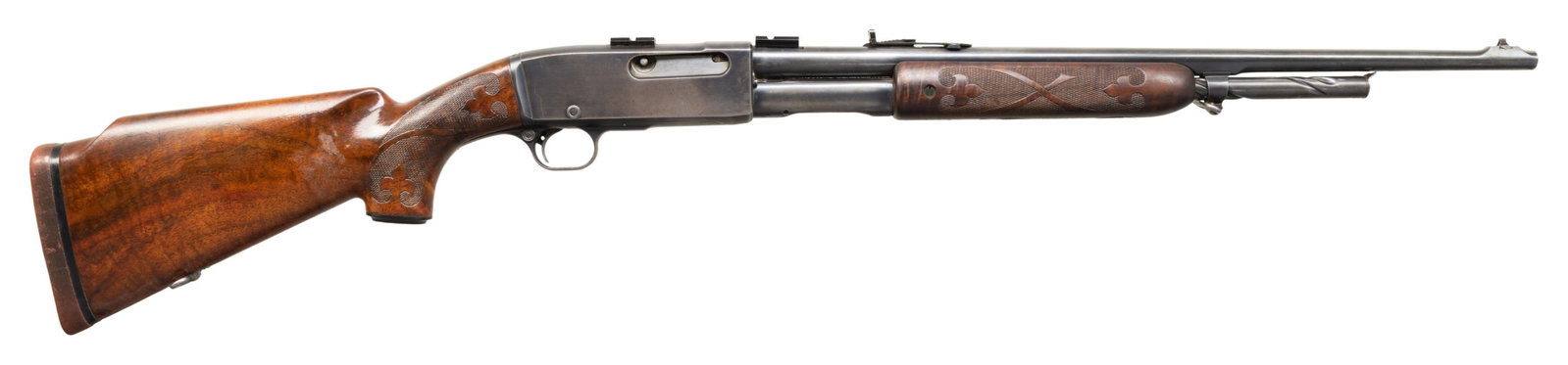 EARLY REMINGTON 141 SLIDE ACTION RIFLE.: Cal. 25 Rem. S# 2203. Bbl. 22" with replacement Marbles dovetailed bead front sight. Elevator adj rear sight. Bbl. & rec tapped with scope blocks added. Fleur de lis accented checkered pistol grip wal