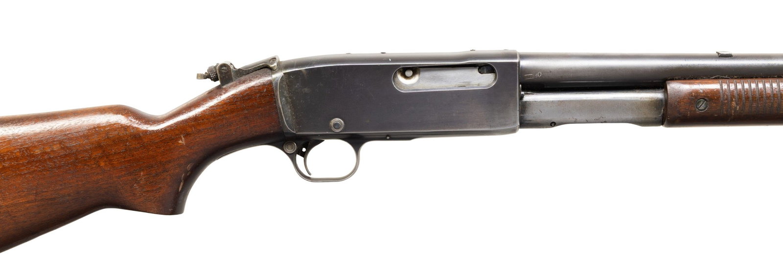 REMINGTON 141 THE GAMEMASTER SLIDE ACTION RIFLE.: Cal. 30 Rem. S# 10959. Mfg 1937. Bbl. 24" with ramped dovetail DW King bead front sight. Rear dovetail is plugged. Rec mounted Lyman peep sight. Smooth pistol grip walnut stock set with checkered stee