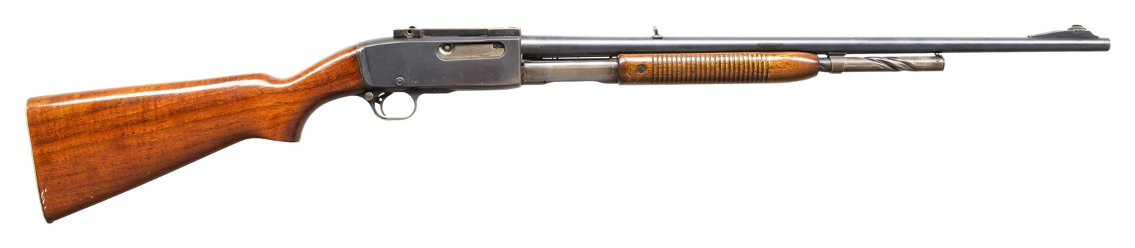 REMINGTON 141 GAMEMASTER SLIDE ACTION RIFLE.: Cal. 35 Rem. S# 49136. Mfg. 1946. Bbl. 24" with ramped dovetailed bead front sight. Flip up rear sight. Rec mounted Redfield scope mount. Smooth pistol grip walnut stock with checkered Remington alumi