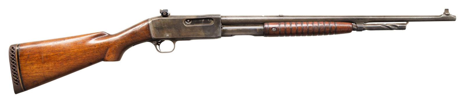 REMINGTON 14 SLIDE ACTION RIFLE.: Cal. 25 Rem. S# C87990. Bbl. 22" with added tall Lyman bead front sight. Rear sight dovetail has filler block. Added Williams rec peep sight. Reshaped pistol grip walnut stock with vent Pachmayer reco