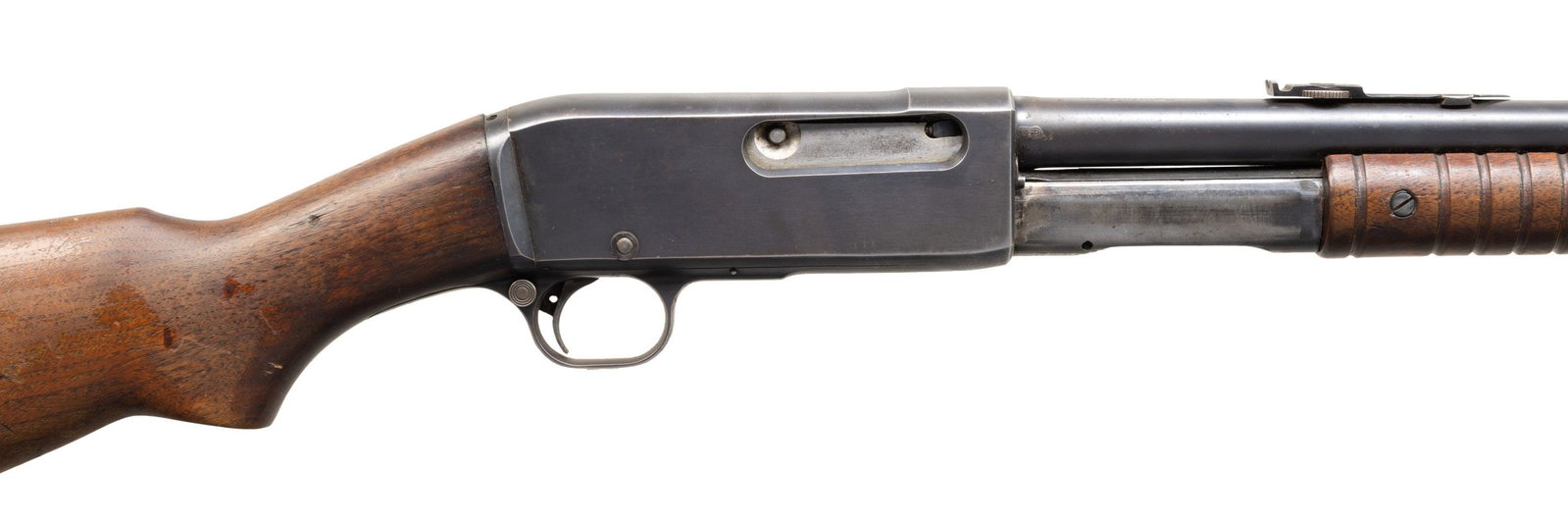 REMINGTON MODEL 14 SLIDE ACTION RIFLE.: Cal. 30 Rem. S#112910. Bbl. 22" with dovetailed blade front sight. Elevation disk adj rear sight. Smooth pistol grip stock with serrated steel buttplate. CONDITION: overall good. 70% thinning orig fin