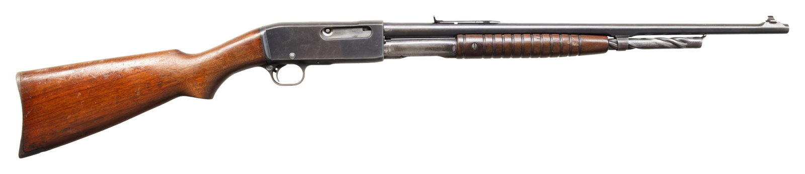 REMINGTON 14 SLIDE ACTION RIFLE.: Cal. 30 Rem. S# 99588. Mfg. 1926. Bbl. 22" with dovetailed bead front sight. Ladder adj rear sight (missing ladder). Top of rec is tapped for scope mounts. Smooth pistol grip walnut stock with serrate