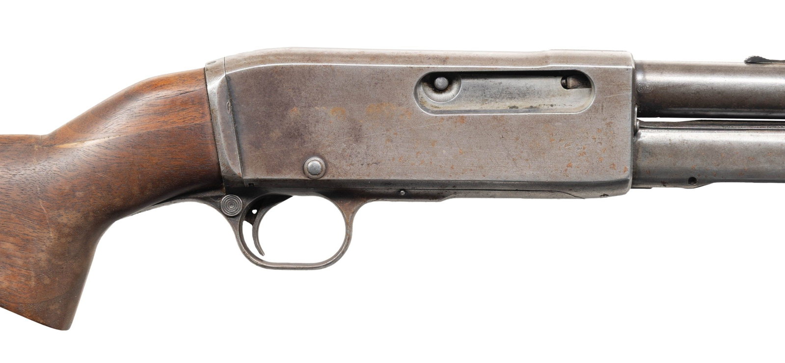 REMINGTON M14R SLIDE ACTION CARBINE.: Cal. 32 Rem. S# C40235. Bbl. 18.5" with dovetailed bead front sight. Ladder adj rear sight. Replacement pistol grip butt stock with extension and Bishop buttplate. CONDTION: overall fair-poor. Bbl and