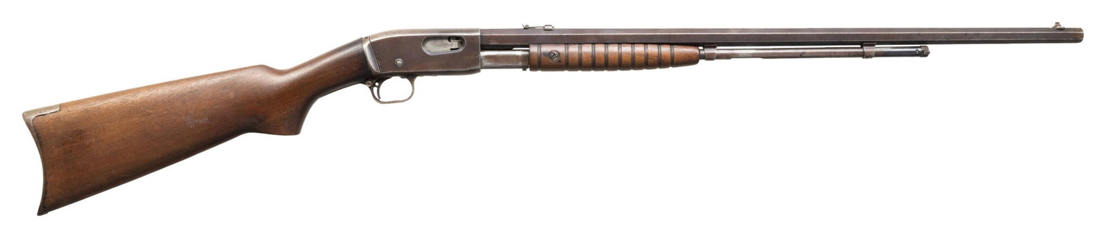 REMINGTON 12C SLIDE ACTION RIFLE.: Cal. 22 Rem Spl. S# 686202 Bbl. 24" oct. dovetailed bead. Height adj dovetailed rear sight. Semi pistol grip walnut stock with smooth Remington UMC crescent buttplate. CONDITION: overall fair. 30% fad