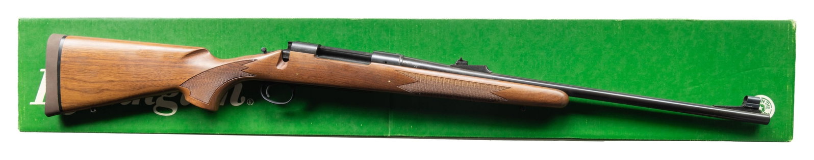 REMINGTON MODEL 700 CLASSIC BOLT ACTION RIFLE.: Cal. 35 Whelen. S# C6285100. 22" hooded ramp white bead front bbl with adj. U notch rear sight. 2 Lug action with X-Mark Pro adjustable trigger. Classic style walnut stock has cut checkering, swivel b