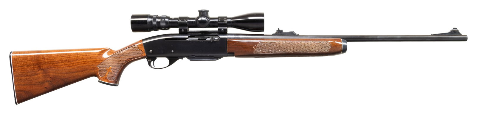243 WIN., REMINGTON 742 WOODSMASTER SEMI AUTO: RIFLE. Cal. 243 Win. S# B7045476. Bbl. 22"; code "DQ" appears to indicate Sept. 1978 mfg. Standard fixed sights along with Bushnell Banner 3-9x, duplex scope. Press checkered walnut stock set. MAGS: 1