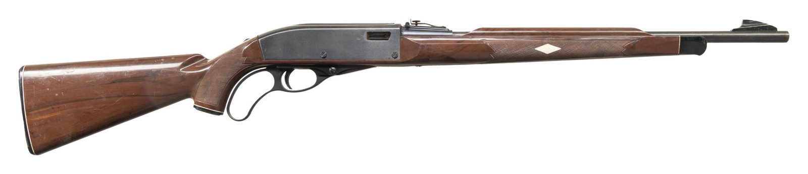 RARE REMINGTON NYLON 76 LEVER ACTION RIFLE.: Cal. 22 LR. S# NSN. Bbl. 19 5/8" having black alloy "shark fin" blade front sight; blued with adjustable rear sight incorporated into the front section of its receiver cover having integral grooves fo