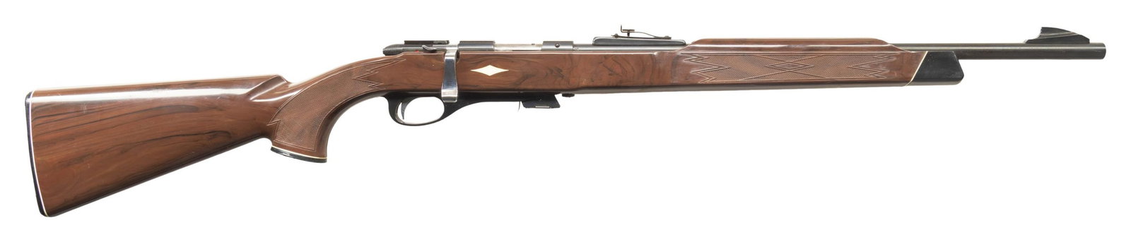 SCARCE REMINGTON NYLON 11 BOLT ACTION RIFLE.: Cal. 22 S, L or LR. S# NSN. Bbl. 19 5/8"" having black alloy "shark fin" blade front sight; blued with adjustable rear sight. Mfg. March 1963 (1962-1964; 22,423 units) as nylon version of earlier Mode