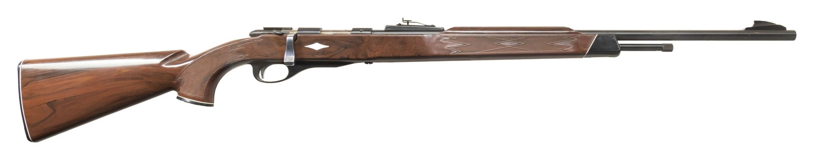 RARE REMINGTON 24" NYLON 12 BOLT ACTION RIFLE.: Cal. 22 S, L or LR. S# NSN. Bbl. 24" (1964 only) having steel "shark fin" blade front sight; blued with adjustable rear sight. Mfg. April 1964 (1962-1964; 27,551 units) as nylon version of earlier Mod