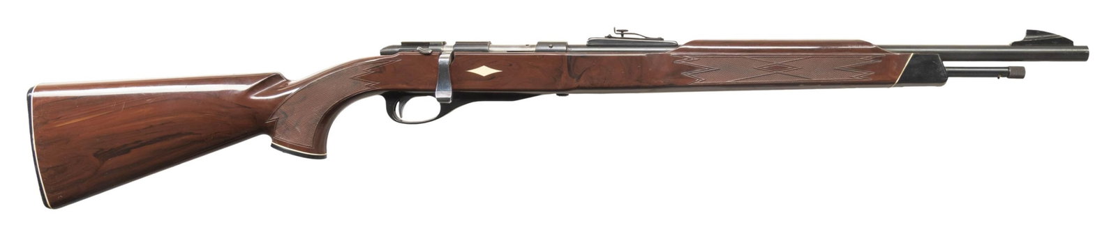 SCARCE REMINGTON NYLON 12 BOLT ACTION RIFLE.: Cal. 22 S, L or LR. S# NSN. Bbl. 19 5/8" having black alloy "shark fin" blade front sight; blued with adjustable rear sight. Mfg. March 1962 (1962-1964; 27,551 units) as nylon version of earlier Model