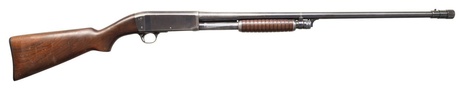 REMINGTON 17 SLIDE ACTION SHOTGUN.: Cal. 20ga. S# 15755. Bbl. 27" over added poly choke. Smooth pistol grip walnut stock with checkered Remington UMC hard rubber buttplate. CONDITION: Overall fair. 40% thinning orig blue with scratches,