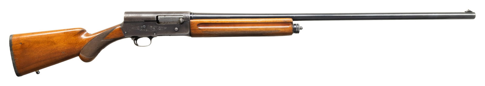 BELGIAN BROWNING A5 MAGNUM SEMI AUTO SHOTGUN.: Cal. 12ga 3" Full. S#. 2V43457. Mfg. 1962. Bbl. 30" with steel bead ramp front sight marked "Browning Arms Company St Louis Mo & Montreal PQ" & "Made in Belgium". Standard factory engraved rec. Checke