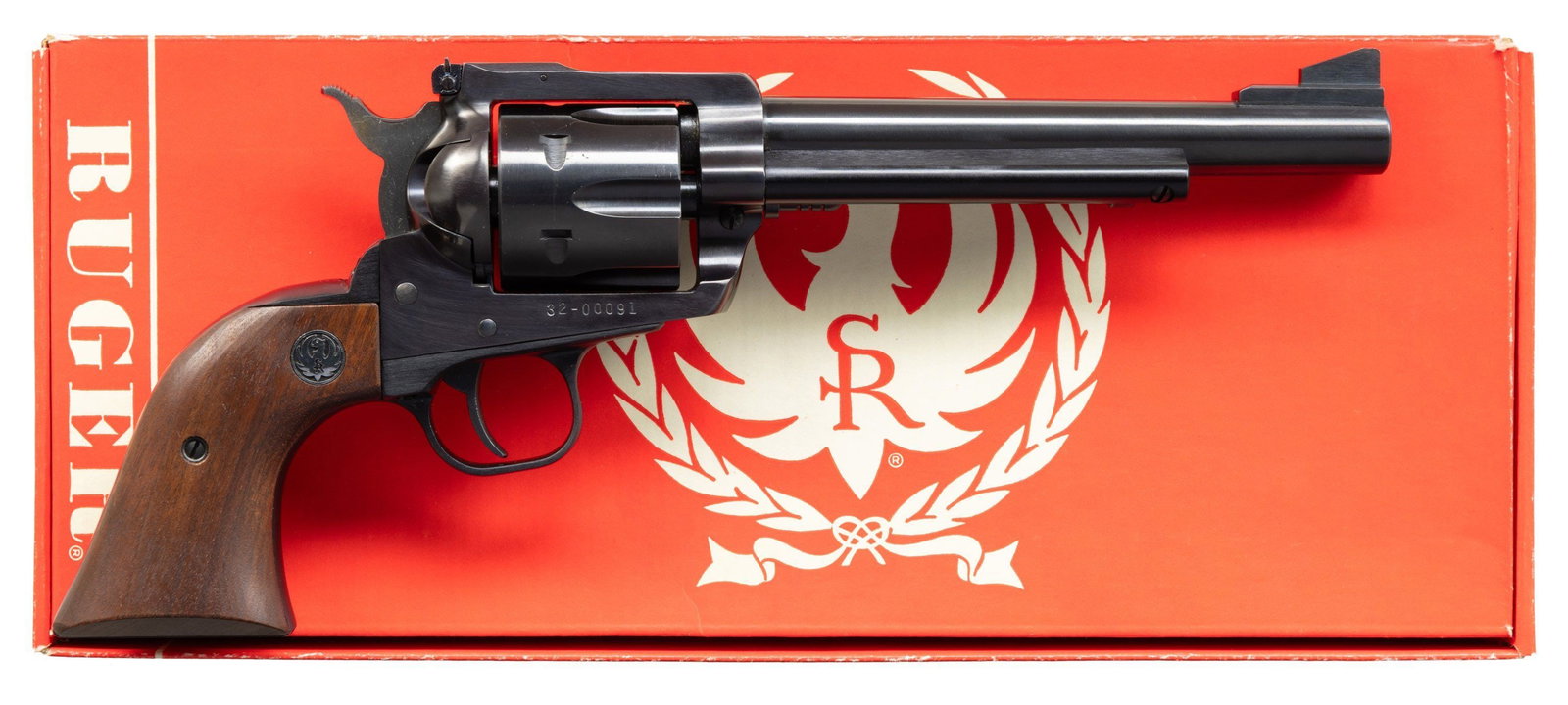 2 DIGIT RUGER NEW MODEL BLACKHAWK REVOLVER.: Cal. 357 Mag.. S# 32-00091. Bbl. 6 1/2" with serrated blade integral to ramped base as front sight plus frame mounted factory adjustable rear sight. Mfg. 1973 (1973 to date) as BN-36 with oiled walnut
