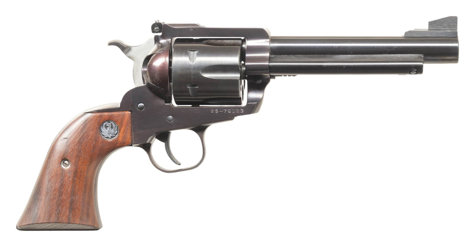 RUGER 5 1/2" NEW MODEL SUPER BLACKHAWK REVOLVER.: Cal. 44 Mag. S# 85-76183. Bbl. 5 1/2" with serrated blade integral to ramped base as front sight plus frame mounted factory adjustable rear sight. Mfg. 1987 (1973 to date for all NM Supers) as S45N (M