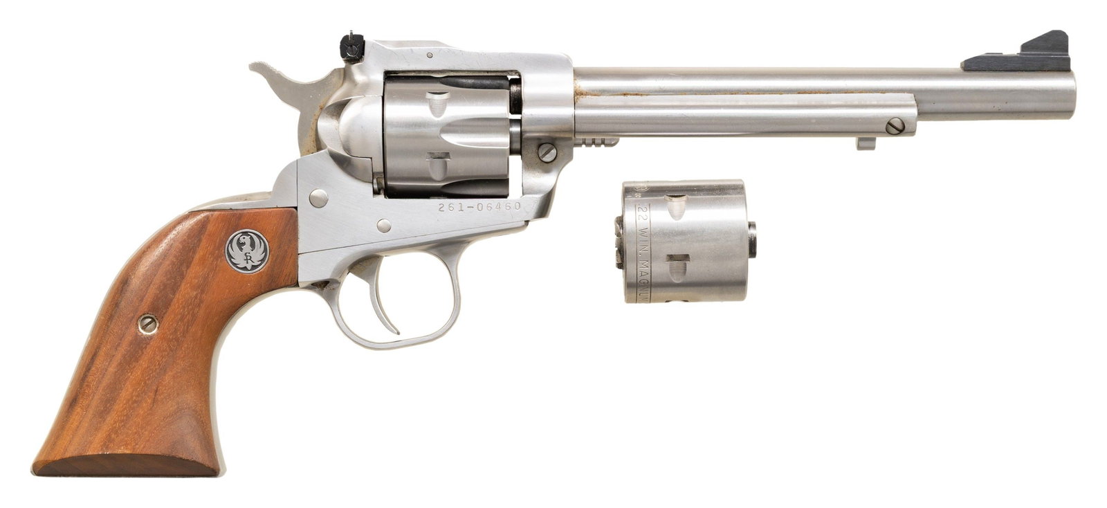RUGER STAINLES NM SUPER SINGLE-SIX CONVERTIBLE: REVOLVER. Cal. 22 LR / 22 Mag. S# 261-16460. Bbl. 6 1/2" with screw attached blued serrated blade on ramped base front sight; factory frame mounted adjustable rear. Mfg. 1985 (1973 to date) as KNR6 wi