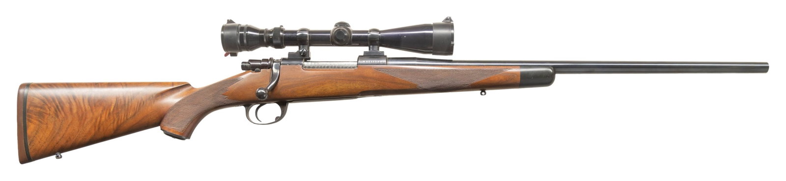 INTERARMS MARK X CUSTOM BOLT ACTION RIFLE.: Cal. 284 Win. S# R251622. Custom 22" medium sporter weight bbl without sights. Redfield 3-9X40 range finding scope on 2 piece mounts. Mauser style action with jeweled bolt body & extractor. Right side