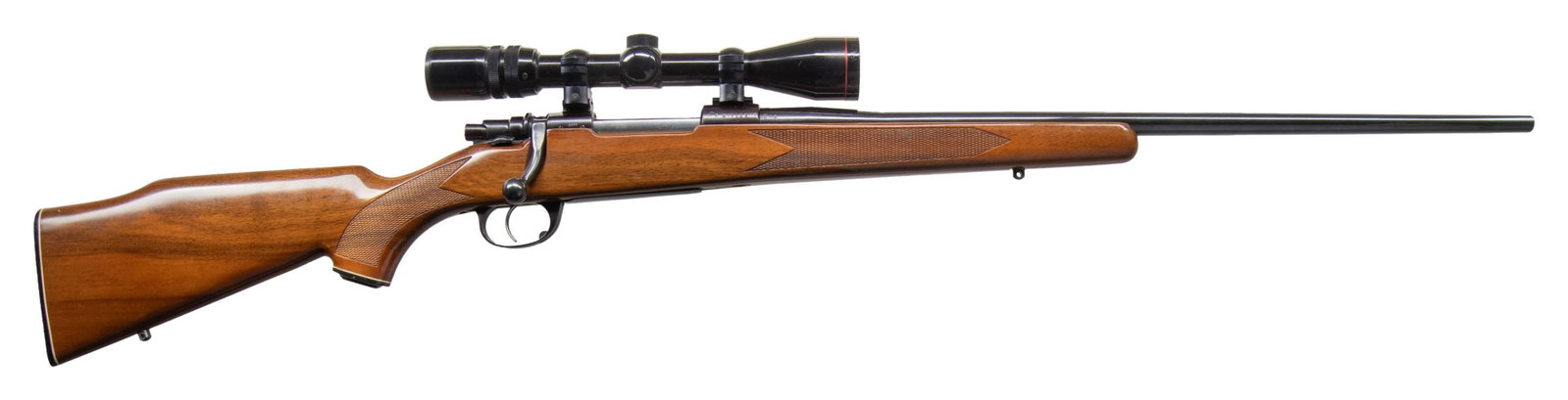 INTERARMS MARK X CUSTOM BOLT ACTION RIFLE.: Cal. 300 Win Mag. S# B204069. 24" bbl without sights. Simmons Deerfield 3-9x40 WA scope with heavy Duplex reticle on Weaver mounts. Mauser style action with right side safety. Monte Carlo cheekpiece c