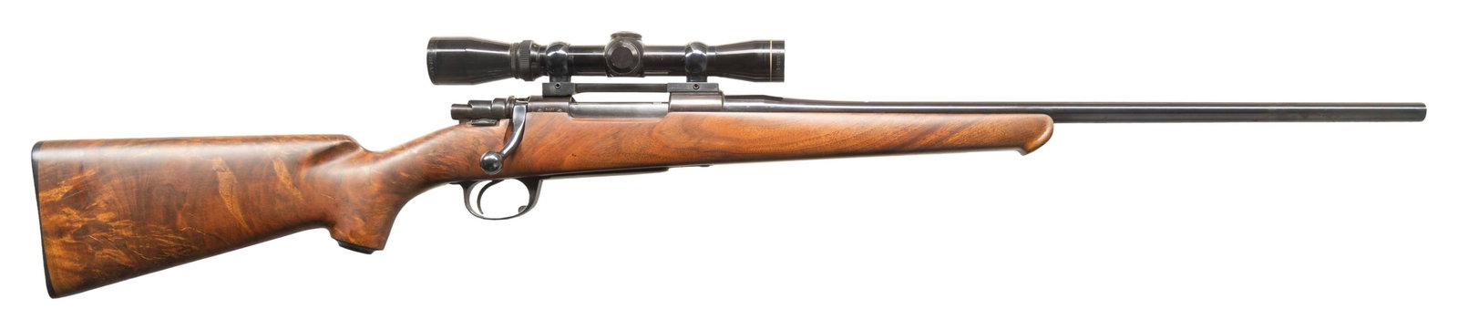 INTERARMS MARK X CUSTOM BOLT ACTION RIFLE.: Cal. 243 Win. S# 0477. Custom C. R. Douglas 22" medium sporter weight bbl without sights. Leupold Vari-X II, 2-7x32 gloss finished scope with duplex reticle on a 1 pc Conetrol mount. Mauser style acti