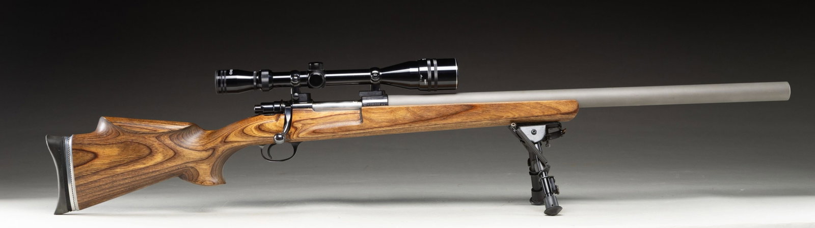 CUSTOM INTERAMS MARK X SINGLE SHOT BOLT ACTION: RIFLE. Cal. 6MM Ackley Imp. S# A296899. Bbl. 26" McGowen stainless bull of 1.2" diameter with bead blasted finish. Fine custom having many special features all executed with fine workmanship. Wildcat 