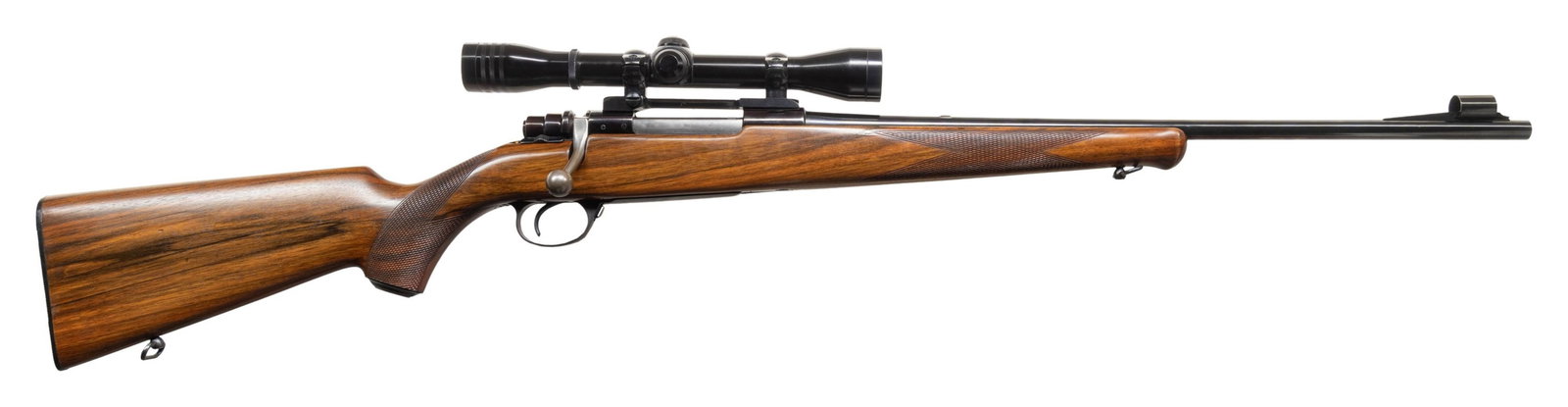 30-06, HUSQVARNA 1640 BOLT ACTION SPORTING RIFLE.: Cal. 30-06. S# 208045. Mfg. 1953-1967. Bbl. 21". Hooded blade front sight, filler in rear dovetail & Redfield 4x wide view duplex scope on Redfield rings 7 base. Model 1640 Mauser style control feed a