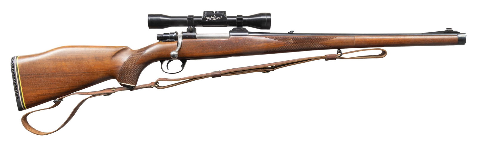 HUSQVARNA MANNLICHER STOCKED BOLT ACTION CARBINE.: Cal 30-06. S# 236848A. 21"ramp mounted bead front bbl with folding leaf rear sight. Weatherby Imperial 4x81 scope with post reticle on Tradewinds 2 pc mounts. Mauser style action with right side safet