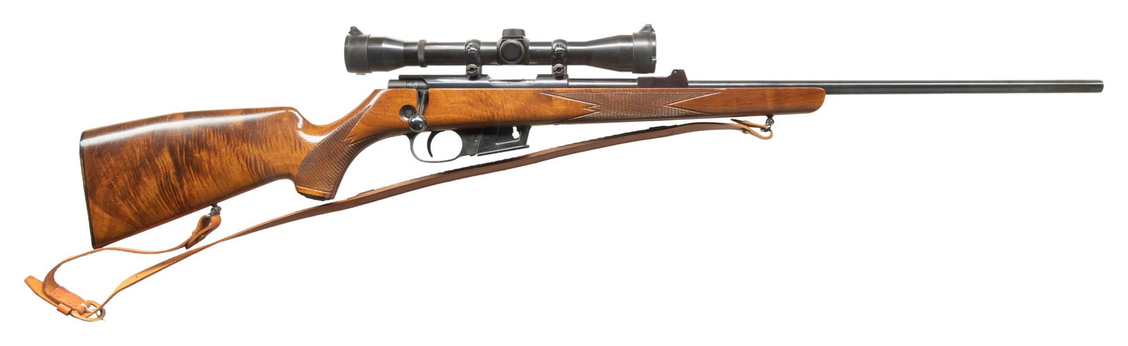WALTHER MODEL KKJ-HO BOLT ACTION REPEATING RIFLE.: Cal. 22 Hornet. S# 1356. 22"bbl. Front sight is removed, base only for the rear sight remains. Weaver K4-1, 4x32 gloss finished scope with duplex reticle on tip-off style rings. Cross bolt safety. Che