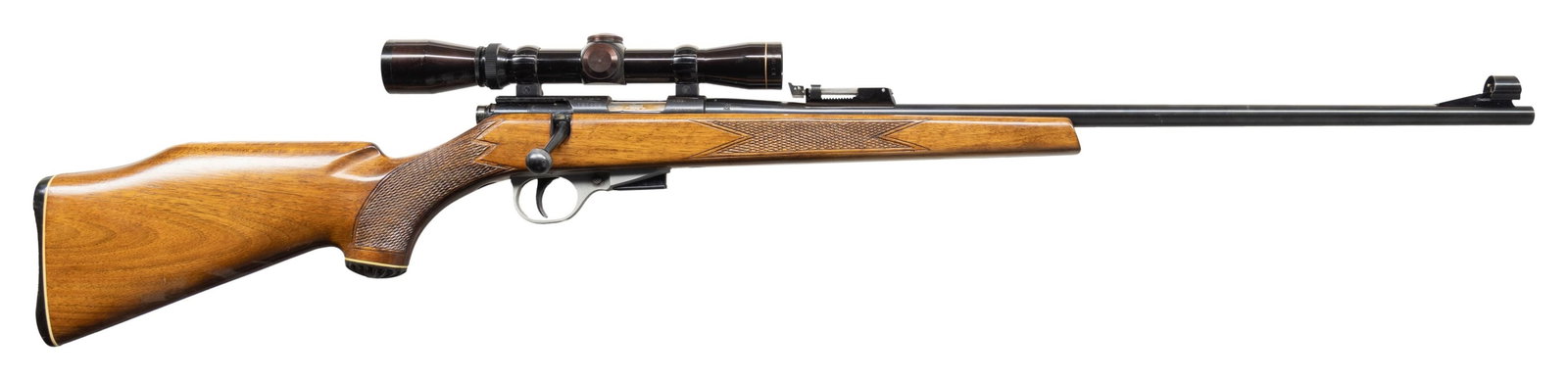 UNIQUE MODEL T DIOPTRA BOLT ACTION RIFLE.: Cal. 22 Mag. S# 101448, Bbl. 24" Interesting French made sporting rifle with hooded ramped bead front sight. Ladder adj rear sight. Leupold 2x7 Vari-X II duplex reticle scope mounted on integral recei