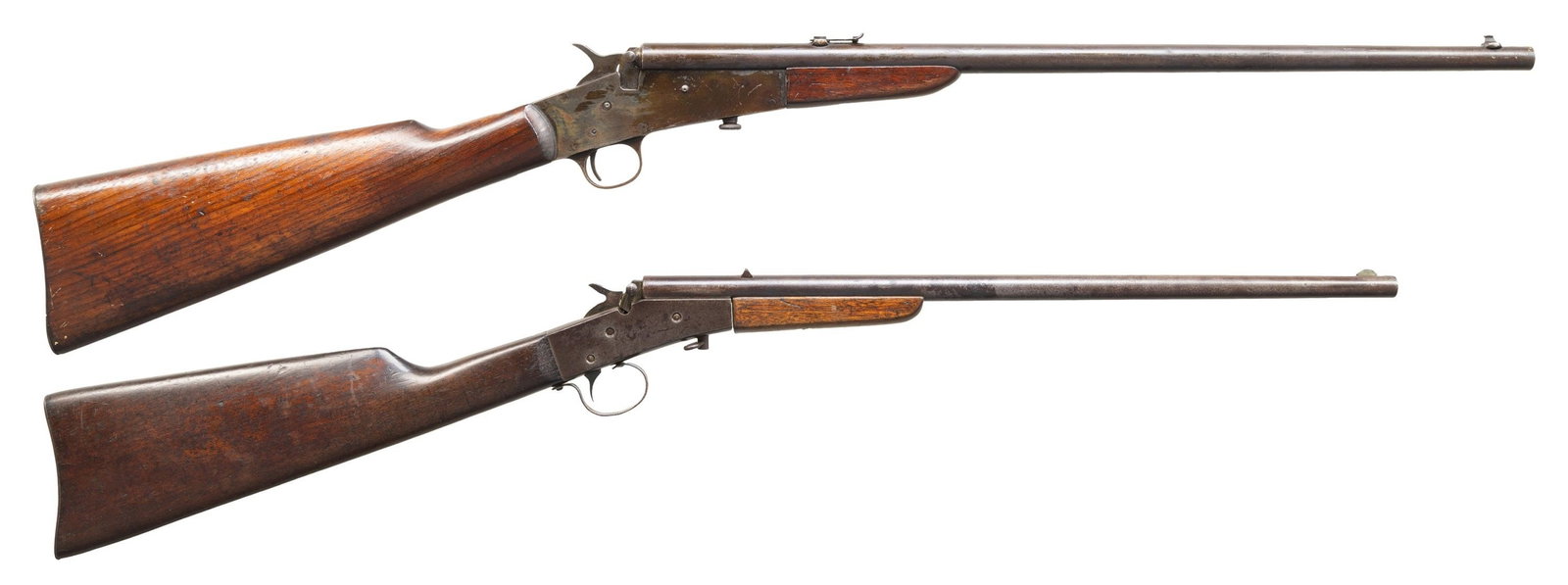 2 SINGLE SHOT BOYS RIFLES.: 1) REMINGTON MODEL 6. Cal. 22 S,L,LR. S# 449825. Bbl. 20"rd with dovetailed bead front sight. Case colored rec. Smooth straight grip walnut stock set with smooth steel Remington buttplate. CONDITION: 