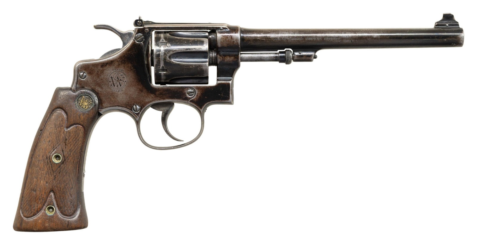 SMITH & WESSON 22/32 BEKEART DA REVOLVER.: Cal. 22 LR.S# 253730. Bbl. 6". Bead front sight. Adjustable square notch rear sight. Matching numbers on frame, bbl., cyl. & extractor. Unnumbered Bekeart grips with gold S&W medallions. Inside of rig