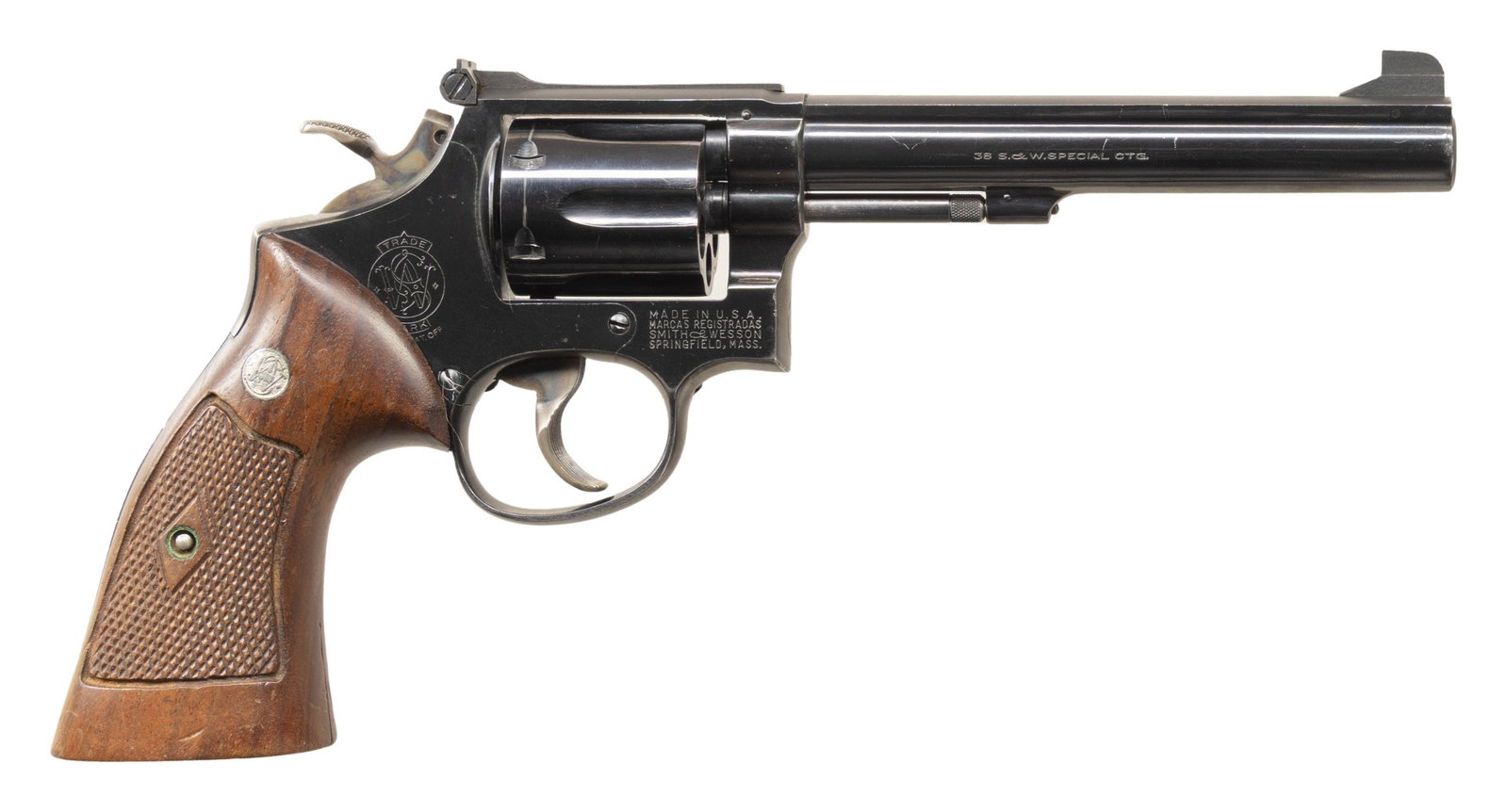 SMITH & WESSON MODEL 14 DA REVOLVER.: Cal. 38 Spl. S# K352184. Bbl. 6" pinned. Patridge front sight. Adjustable square notch rear sight. 1959 made no-dash 14 revolver. 6-shot cyl. Blued finish with case colored target hammer & trigger.