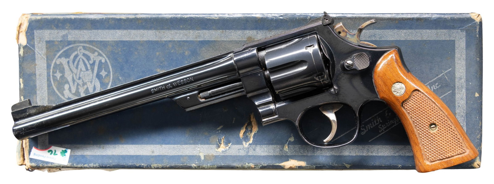 SMITH & WESSON MODEL 27-2 DA REVOLVER.: Cal. 357 Mag. S# S330924. Bbl 8 3/8". Patridge front sight. Adjustable square notch rear sight. 27-2 revolver made 1969-1970. Blued finish with case colored target hammer & trigger. Checkered walnut g