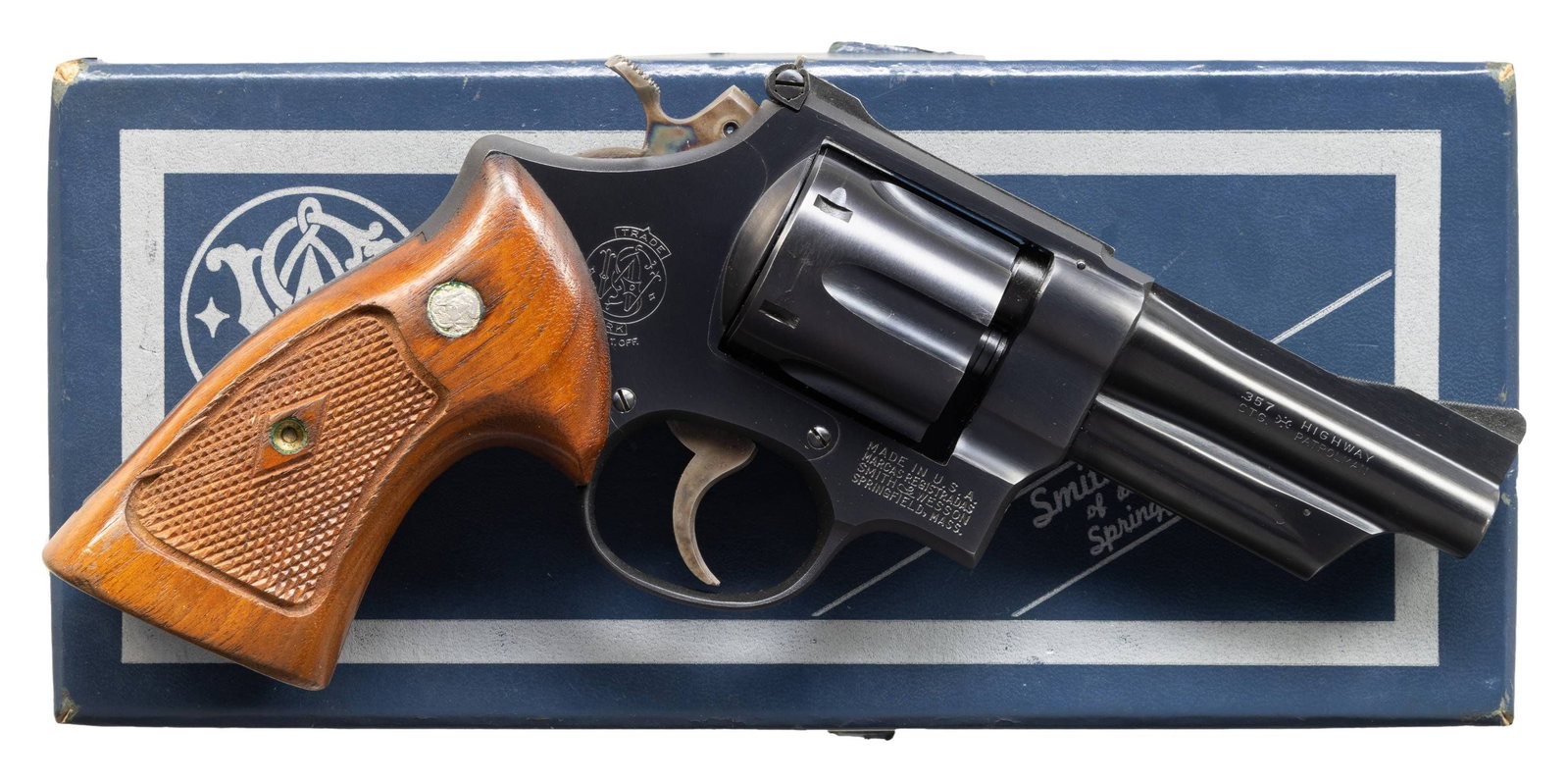SMITH & WESSON MODEL 28-2 DA REVOLVER.: Cal. 357 Mag. S# S306968. Bbl. 4" pinned. Ramped serrated blade front sight. Adjustable square notch rear sight. 1968-1969 made 28-2 revolver. Recessed 6-shot cyl. Blued finish with case colored hamme