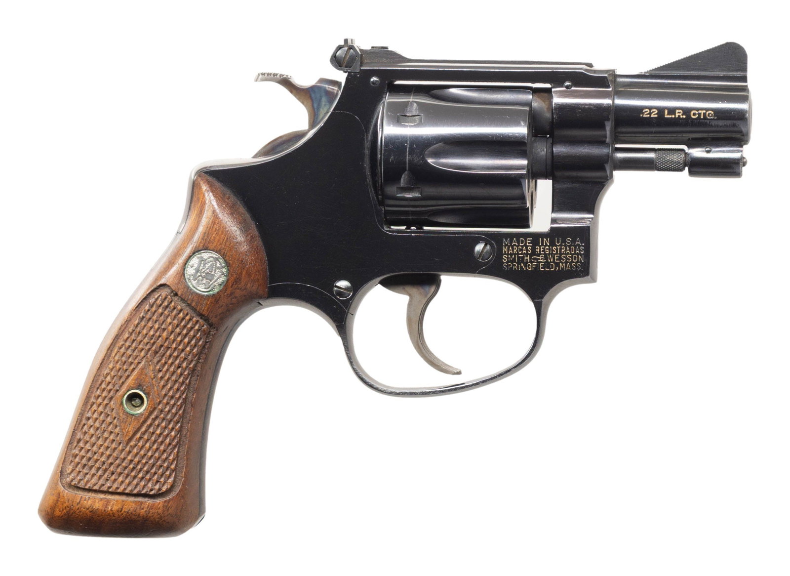 SMITH & WESSON MODEL 34 DA REVOLVER.: Cal. 22 LR. S# 82582. Bbl. 2" pinned. Ramped serrated blade front sight. Adjustable square notch rear sight. No-dash Model 34 revolver. 6-shot recessed cyl. Varied markings have added highlight paint.