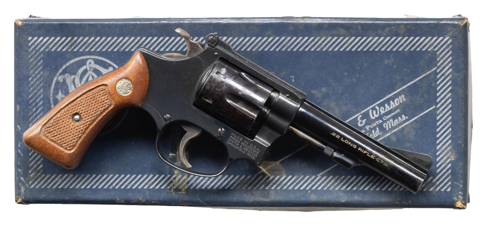 SMITH & WESSON MODEL 34-1 DA REVOLVER.: Cal. 22 LR. S# M171455. Bbl. 4" pinned. Ramped serrated blade front sight. Adjustable square notch rear sight. S&W 34-1 revolver made 1978-1979. 6-shot recessed cyl. Blued finish with case colored ham