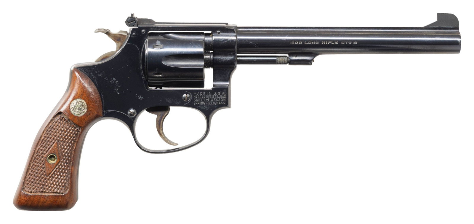 SMITH & WESSON MODEL 35 DA REVOLVER.: Cal. 22 LR. S# 46733. Bbl. 6" pinned. Patridge front sight. Adjustable square notch rear sight. No-dash Model 35 revolver made in the late 1950s. 6-shot recessed cyl. Blued finish with case colored tr