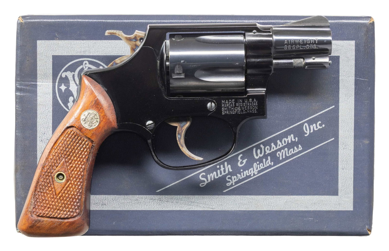 SMITH & WESSON MODEL 37 REVOLVER.: Cal. 38 Spl. S# 411600. Bbl. 2" pinned. Ramped serrated blade front sight. Fixed rear sight. No-dash 37 revolver made in the 1960's. 5-shot cyl. Blued finish with case colored hammer & trigger. Checke